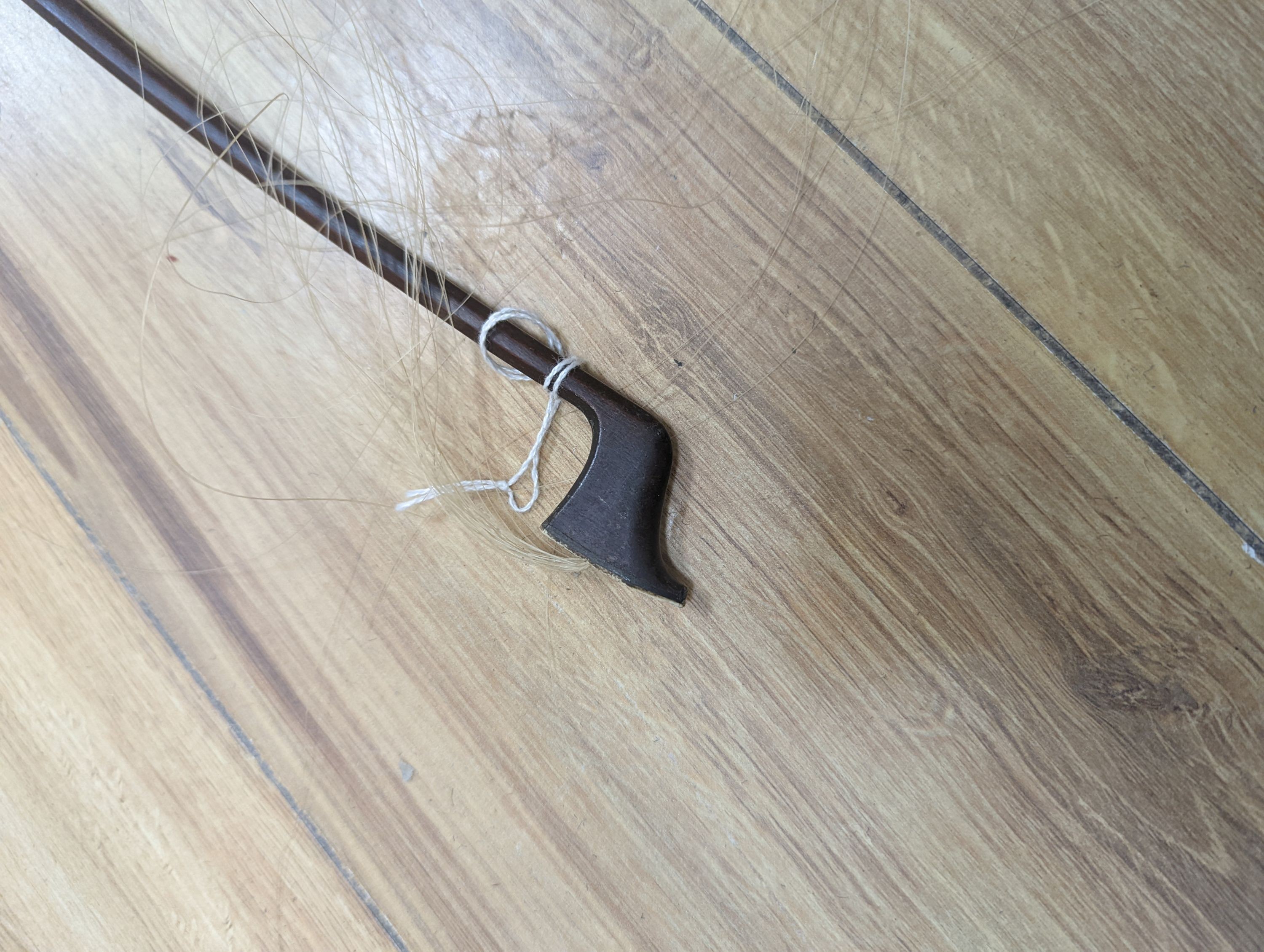 A violin and bow, various records etc